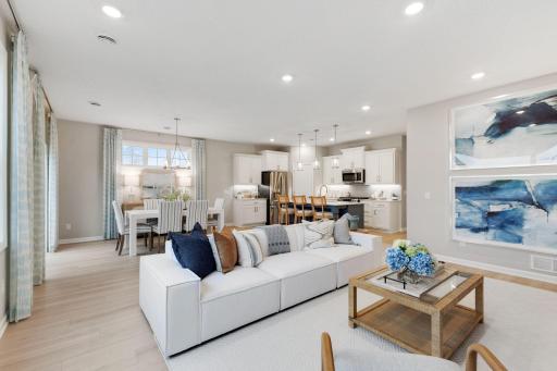 With LVP throughout the family room, dining area and kitchen, the options for furniture arrangement are endless.