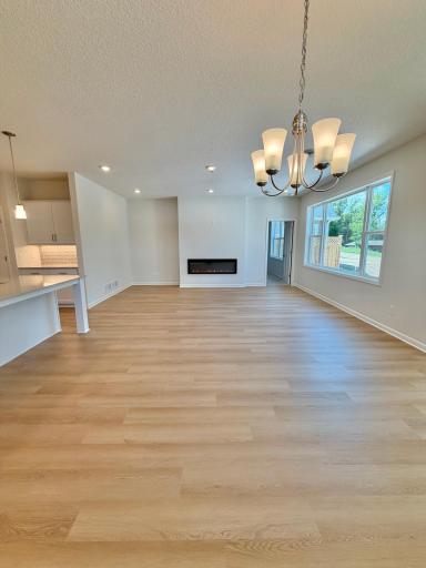 Actual home, from the perspective of the dining space. The open concept layout is perfect for entertaining!