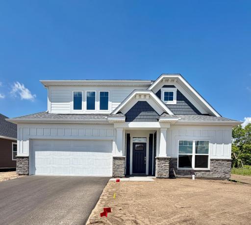 Photo of actual home - irrigation, sod, and landscaping are all included!