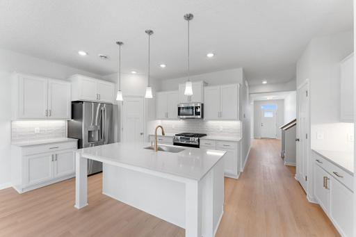 All kitchen appliances are included! Stainless GE French door refrigerator, gas range, microwave and dishwasher.