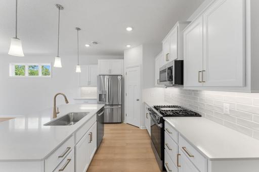 Corner pantry is perfect for extra storage!