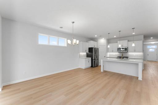 Transom windows in the dining room bring in extra light!
