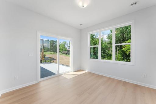 Sliding door leads to your patio with cedar privacy fence.