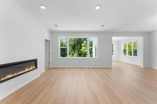 View of the trees from every window at the back of the home!