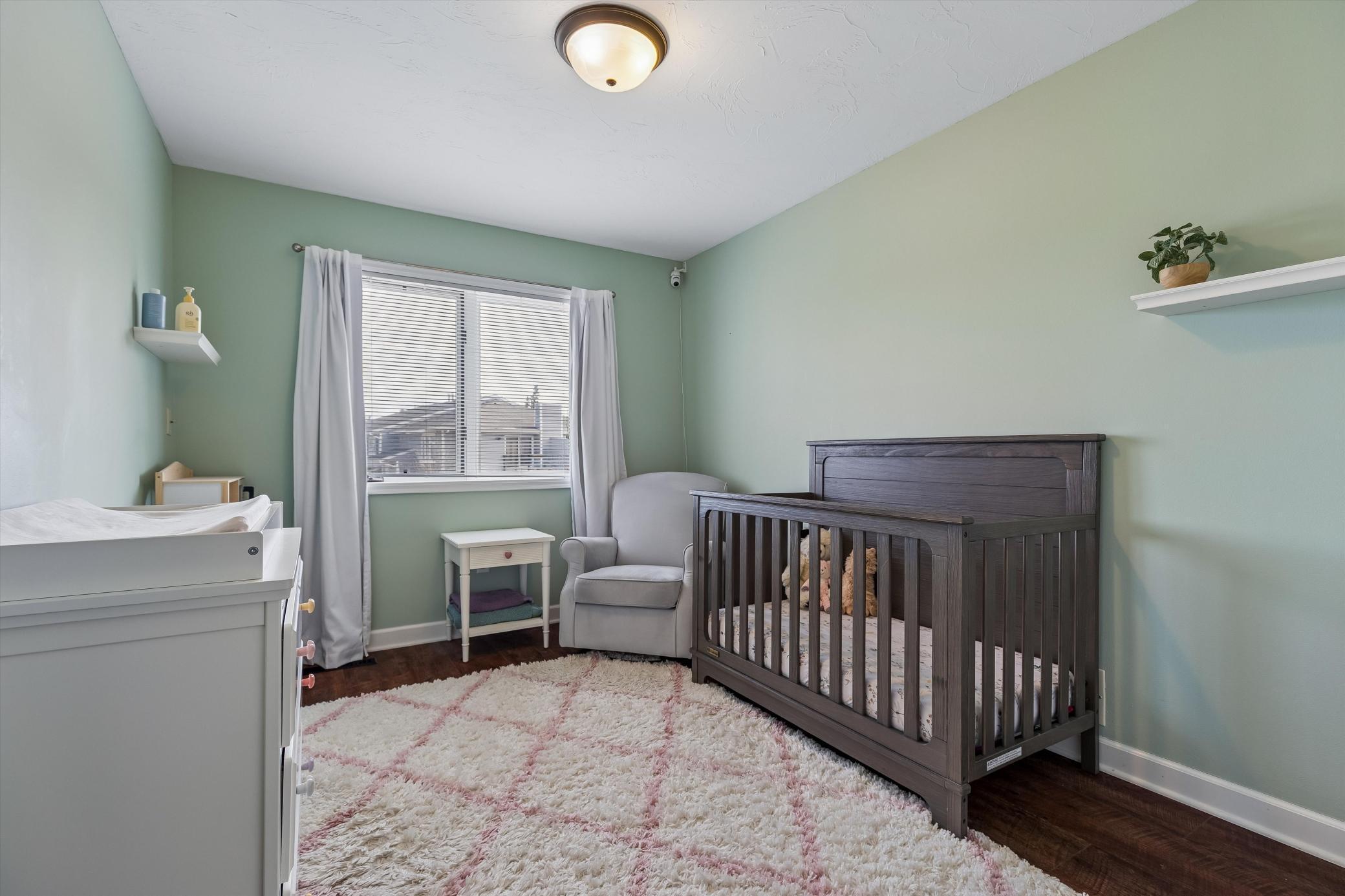 Spacious bedroom with beautiful natural lighting.