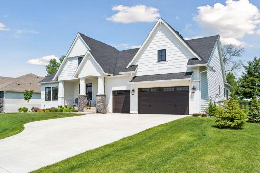 A large concrete driveway provides great off street parking for guests.