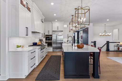 Under cabinet lighting, large bid drawers and high end appliances.