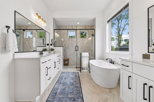 Spa-like bathroom with a comfortable soaking tub.