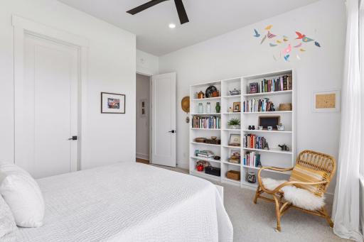 Bedrooms 2 and 3 with a large guest bathroom between them.
