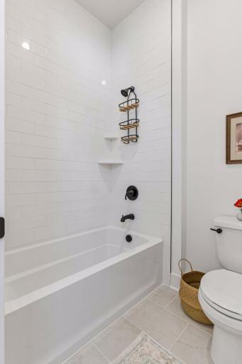 A deep soaking tub in the guest bathroom.