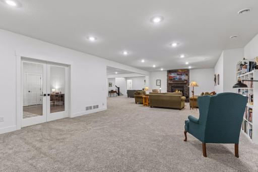 Expansive lower level with rough-in for a wet bar.