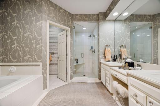 Primary full bath suite with steam shower