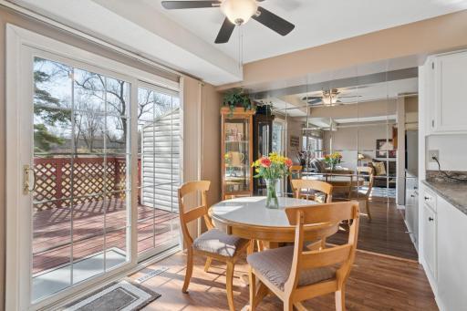 8525 W 97th Street Circle - walk out to the large deck from the eat in kitchen