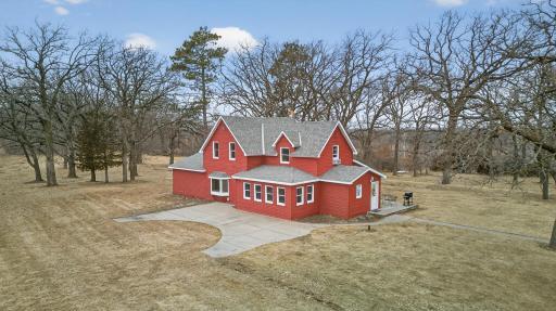 Charming country farmhouse surrounded by mature trees 20+/- acres for rural living.