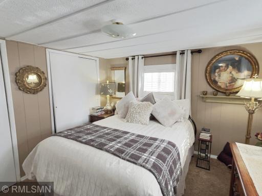 This property offer a beautiful primary bedroom with a large closet.