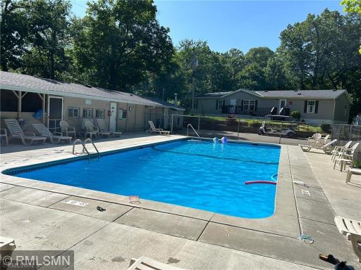 Enjoy the heated pool in the summer next to the activity building, picnic area, playground.