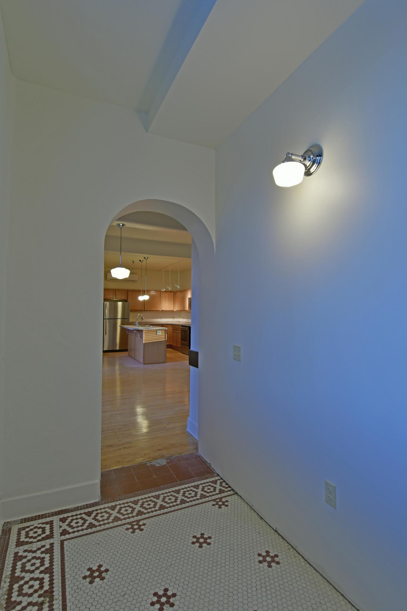 1447_interior_arch_door_into_unit.jpg