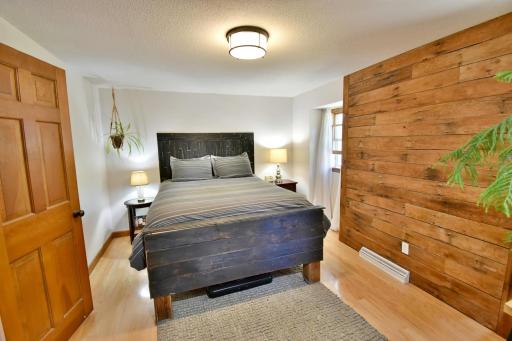 One of Four Upper-Level Bedrooms with Chic Wood Wall!!!
