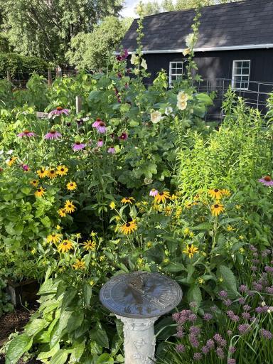 Some of the Many Beautiful Plantings Around this Well Cared for Home and Manicured Yard!!!