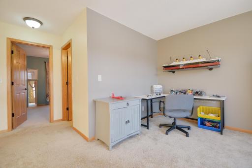 Loft area currently used as office/flex space