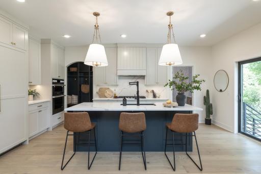 Large center island with quartz countertop