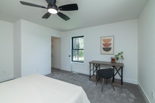 Spacious bedroom with room for desk or work area