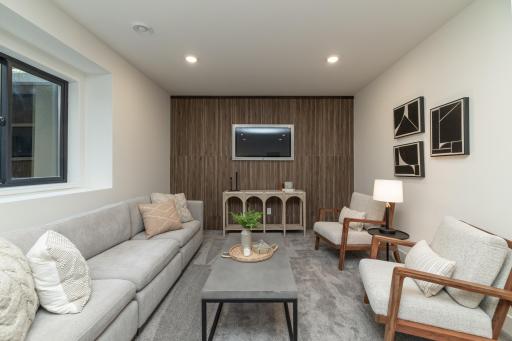 Beautiful family room with custom ceramic wall
