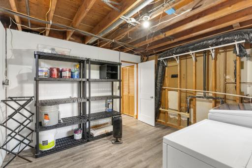 HUGE laundry space with ample room for storage