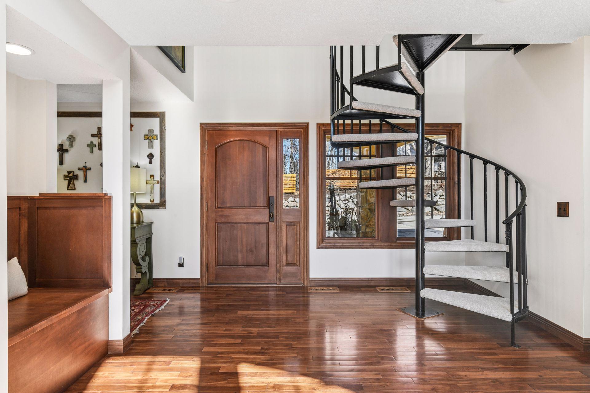 Full size, newly carpeted, spiral staircase
