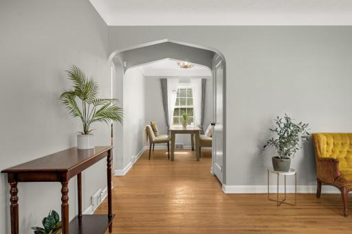 The dining room and living room flow well together.