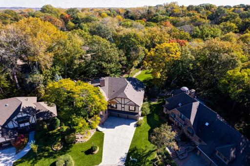 âSet on a quiet cul-de-sac, this home enjoys a private, wooded backdrop with mature trees and a beautifully landscaped yard, offering a peaceful retreat with scenic surroundings.â