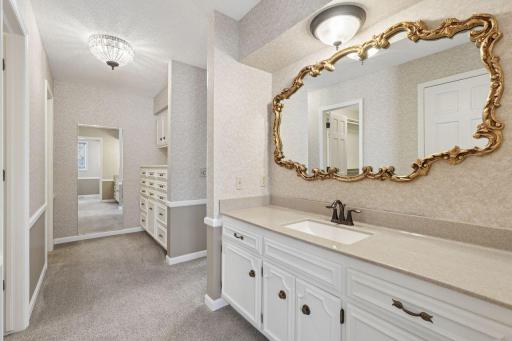âHallway features a built-in dresser and a spacious vanity area, with a private toilet room across the hall for added convenience and functionality.â