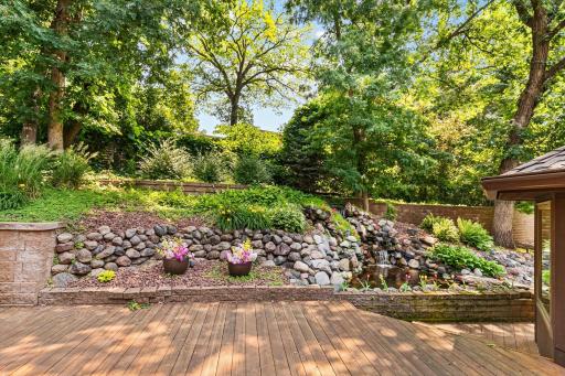 Just out the large sunroom is this amazing waterfall, enjoy the sounds, the wildlife and privacy.