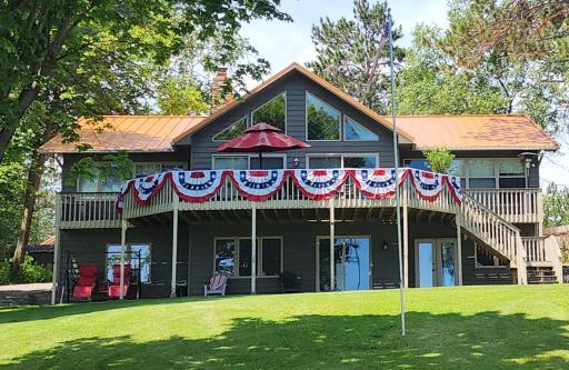 Enjoy the oversized lakeside deck and walk out basement