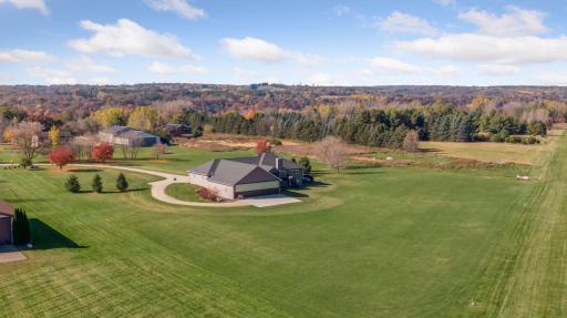 Custom built Hartman Home with attached hangar tucked behind