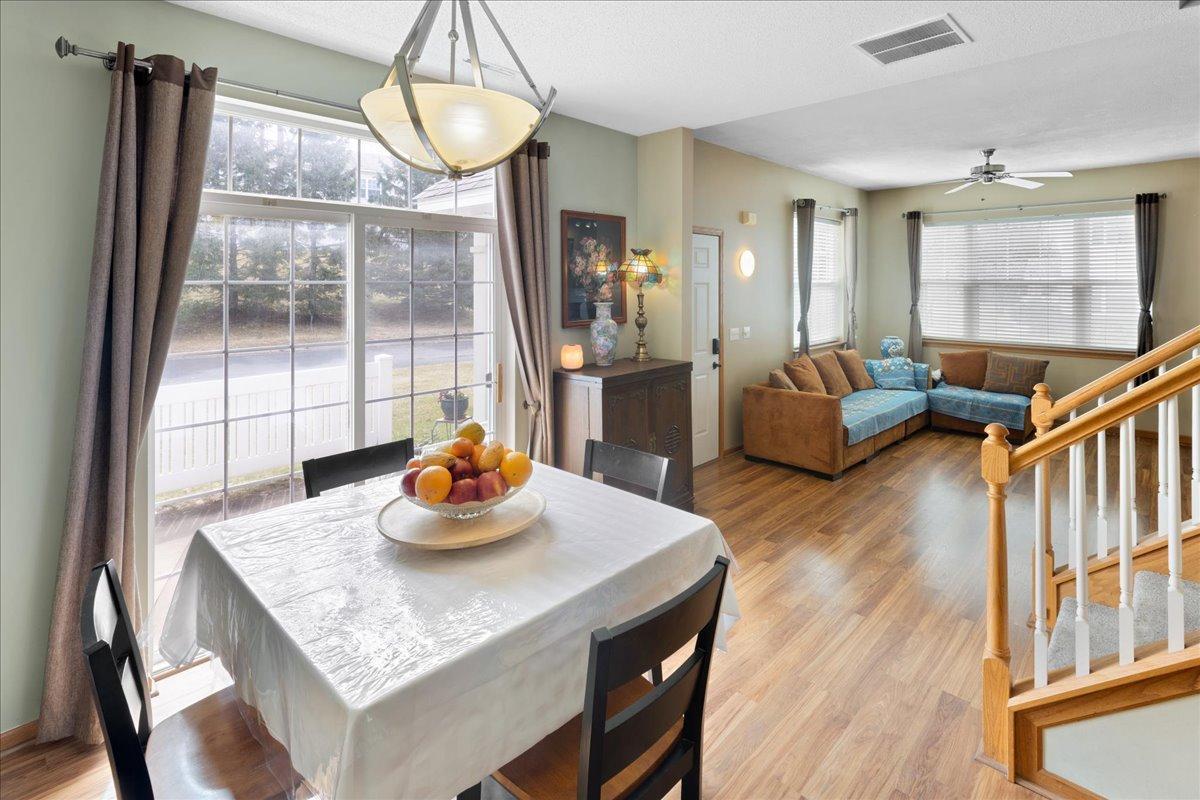 Open-concept living and dining area with excellent natural light and flow.