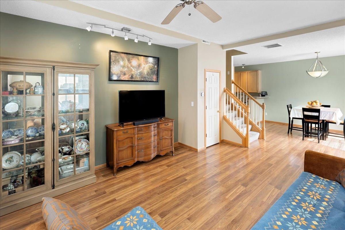 Open-concept living and dining area with excellent natural light and flow