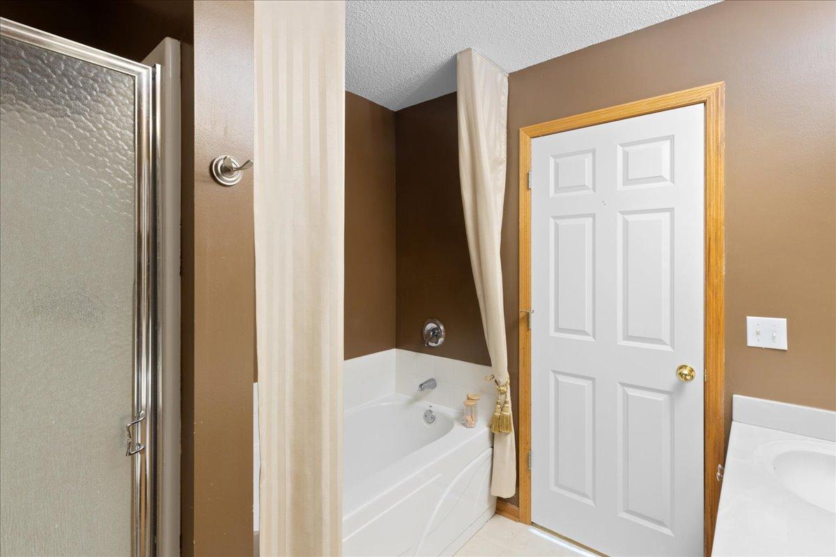 Primary bath with walk-in shower and seperate soaking tub