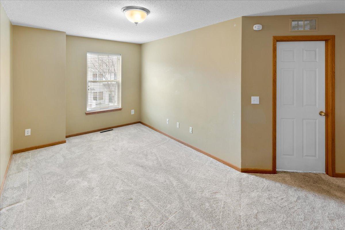 Versatile upper-level living space ideal for a second family room or office!