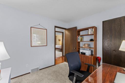 Third bedroom on upper level with view to hallway