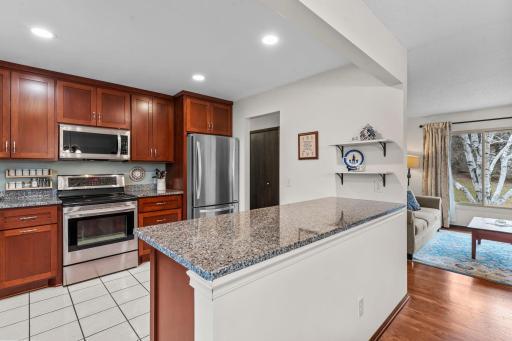 Recently remodeled kitchen with solid cherry cabinetry throughout!