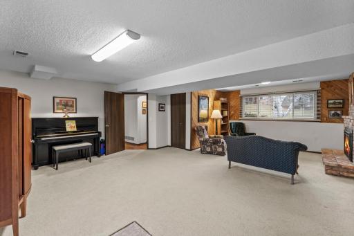 Family room with view to hallway. Door to family room allows quiet space