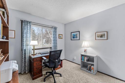 Third bedroom on upper level, currently being used as an office