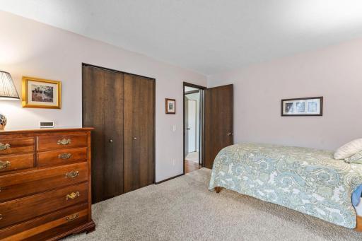 Second bedroom on upper level with view to hallway