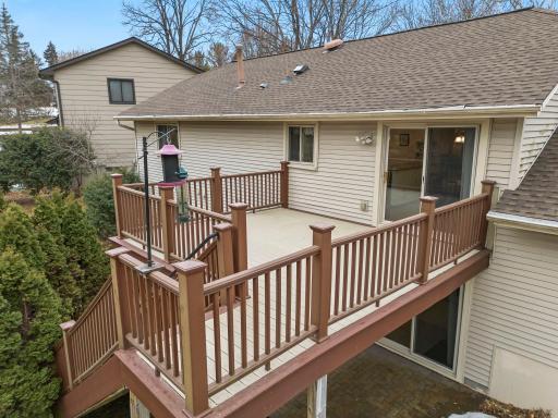 Large maintenance free deck with patio door access from upper level