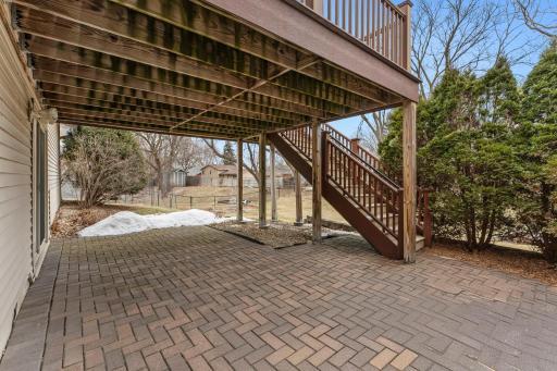 Paver patio area with access from lower level patio door