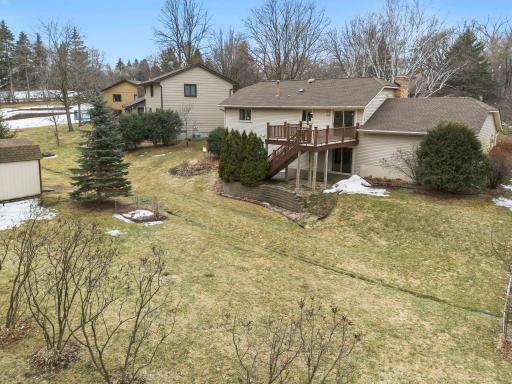 View of home and large backyard