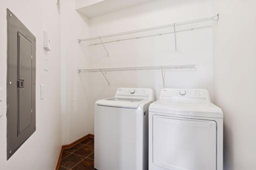 The in-unit laundry room provides added convenience as well as additional storage space.