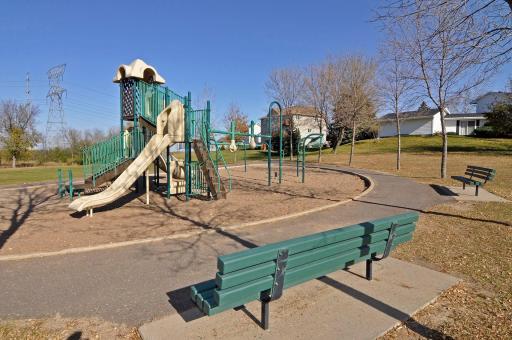 Just a short trail walk to Sunset Ridge Park - a peaceful park setting with walking trails, playground and more!