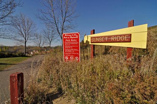 Just a short trail walk to Sunset Ridge Park - a peaceful park setting with walking trails, playground and more!